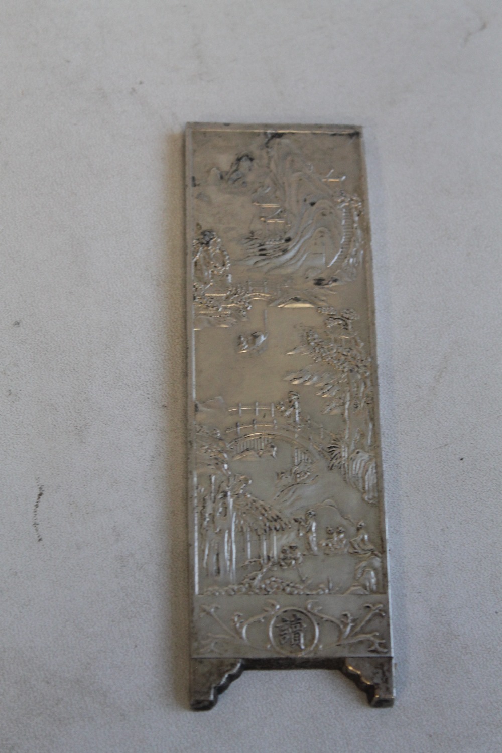 FOUR CHINESE WHITE METAL INGOT PLAQUES, decorated with various scenes 14.5 cm x 4.5 cm - Image 2 of 6