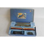 A BOXED HORNBY DUBLO EDP12 PASSENGER TRAIN SET, containing a gloss 3 rail "Duchess of Montrose" BR