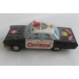 A YONEZAWA (JAPAN) TIN PLATE BATTERY OPERATED HIGHWAY PATROL NUMBER 649 POLICE CAR