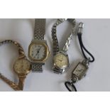 OMEGA , A SMALL LADIES STEEL MANUAL WIND WRIST WATCH, along with three other Ladies wrist watches,