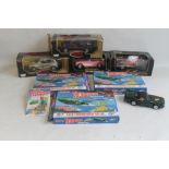 FOUR BOXED BURAGO 1;18 SCALE DIECAST VEHICLES BY BURAGO AND MOTOR MAX, together with three boxed