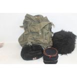 A MILITARY STYLE RUCKSACK AND MILITARY STYLE HATS from France, Russia and Great Britain