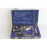 A VINTAGE EVETTE CLARINET IN CASE