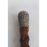 A WHITE METAL CAPPED ANGLO INDIAN WALKING CANE, the cap inscribed S. Warren Ipswich 1898 length 83