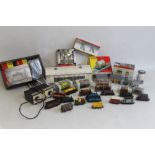 A COLLECTION OF HORNBY 'OO' GAUGE RAILWAY ITEMS to include two 0-4-0 tank locomotives (Santa Express