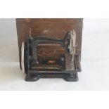 A "GEM" SEWING MACHINE BY WHITE SM CV CLEVELANT OHIO "USA", in original wooden carry case