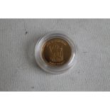 A 2012 'MEDALLIC' GOLD 1953 CORONATION HALF CROWN