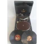 AN HMV HIS MASTERS VOICE MODEL 101 PORTABLE GRAMOPHONE, together with a collection of various 78 RPM