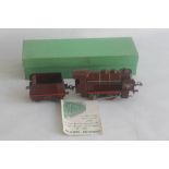 A BOXED FRENCH HORNBY SERIES "O" GAUGE TINPLATE ELECTRIC 0-4-0 LOCOMOTIVE, 0E steam with tender SNCF