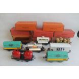 A BOXED FRENCH HORNBY SERIES "0" GAUGE 4 BARREL WAGON, together with seven boxed French Hornby