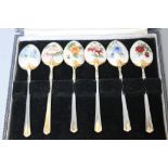 A CASED SET OF HALLMARKED SILVER GILT AND ENAMEL COFFEE SPOONS - BIRMINGHAM 1967, W 15 cm