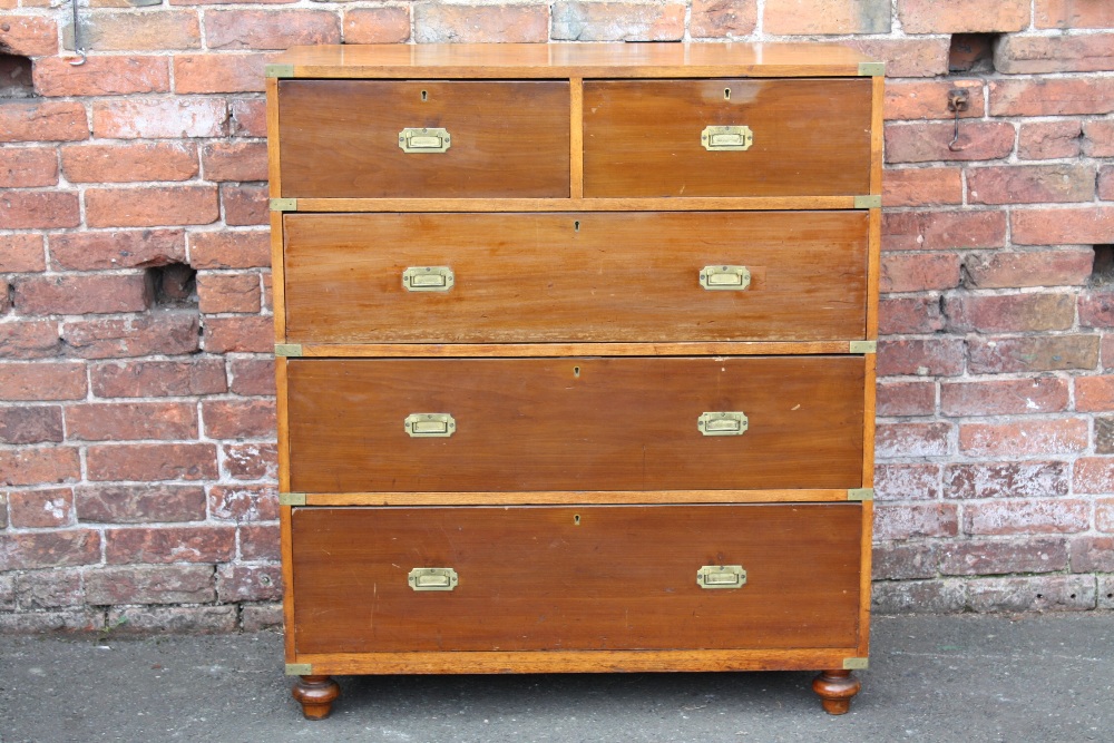 A 19TH CENTURY HARDWOOD CAMPAIGN CHEST, typically split in two parts, having inset brass handles,