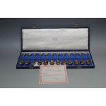 A CASED SET OF TWELVE HALLMARKED SILVER GILT 'ROMAN' TEASPOONS BY JOHN PINCHES - LONDON 1971, approx