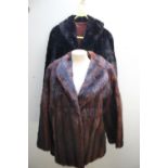 TWO LADIES VINTAGE REAL FUR COATS, comprising a short musquash striped brown jacket and a black