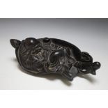 A CARVED CHINESE STYLE FIGURE, W 30 cm