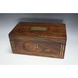 A ROSEWOOD AND INLAID BRASS DRESSING BOX, including contents, W 28.5 cm, A/F