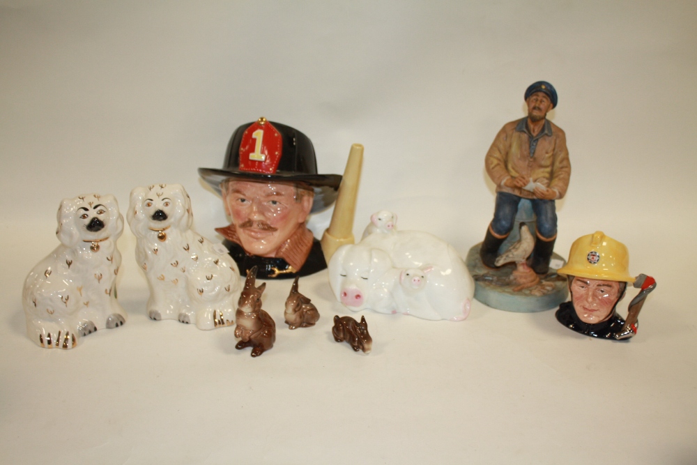 A COLLECTION OF ROYAL DOULTON AND BESWICK FIGURES TO INCLUDE A ROYAL DOULTON 'THE FIREMAN' CHARACTER