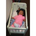 A VINTAGE DOLLS COT TOGETHER WITH A DOLL