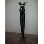 A WROUGHT IRON TALL PLANT STAND