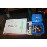 A COLLECTION OF TOYS TO INCLUDE TWO TUBS OF LEGO, A NINTENDO WII FIT ETC.