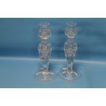 A PAIR OF CUT GLASS THISTLE SHAPED CANDLESTICKS