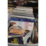 A QUANTITY OF RECORDS AND SINGLES TO INCLUDE ABBA, SHIRLEY BASSEY, DIANA ROSS ETC.