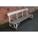 AN ORIGINAL LORDS CRICKET GROUND BENCH NUMBERED 1, 2, 3 AND 4, the seat with four wooden slats