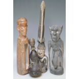 A COLLECTION OF FOUR CARVED HARDWOOD TRIBAL FIGURES, tallest H 46 cm (4)