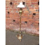 A LATE 19TH CENTURY EXTENDING BRASS LAMP STANDARD WITH HINKS BURNER, the reservoir with incised