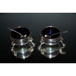 A PAIR OF HALLMARKED SILVER SALT DISHES BY TESSIERS LTD - LONDON 1963, together with a silver salt