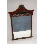 AN ORIENTAL STYLE RED LACQUER FRAMED MIRROR WITH CHINOISERIE DECORATION, overall H 71 cm, W 46 cm