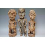 A COLLECTION OF THREE CARVED HARDWOOD TRIBAL FIGURES, average H 40 cm (3)