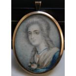 A 19TH CENTURY OVAL PORTRAIT MINIATURE ON IVORY, head and shoulder study of a young woman,
