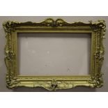 A 19TH CENTURY GOLD SWEPT FRAME, frame W 9 cm, rebate 65 x 55 cm