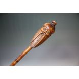 A CHINESE TYPE BAMBOO WALKING CAN WITH CARVED CHARACTER HEAD, L 87 cm