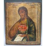 AN EARLY RELIGIOUS ICON, Study of Jesus holding a chalice with inscriptions in Cyrillic script,