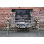 A GEORGIAN STYLE BRASS AND CAST ANTIQUE FIRE BASKET, of serpentine form, having cast rollers to rear