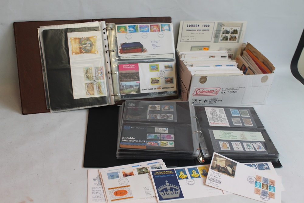 A BOX OF OVER 300 BRITISH FIRST DAY COVERS, together with an album of first day covers and an