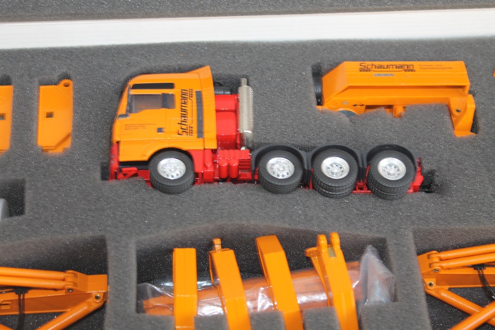 A BOXED CORGI "SCHAUMANN" HEAVY HAULAGE TRACTOR, with Goldhofer Lift Lever 16 Axle Bridge Trailer - Image 3 of 4