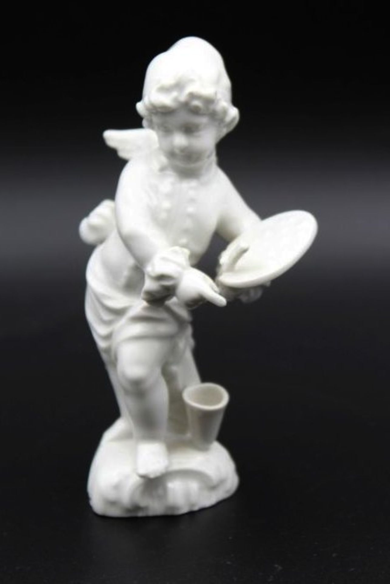 kl. Figur, malender Putto, KPM Berlin, Szeptermarke, Weißporzellan, H-10,5cm