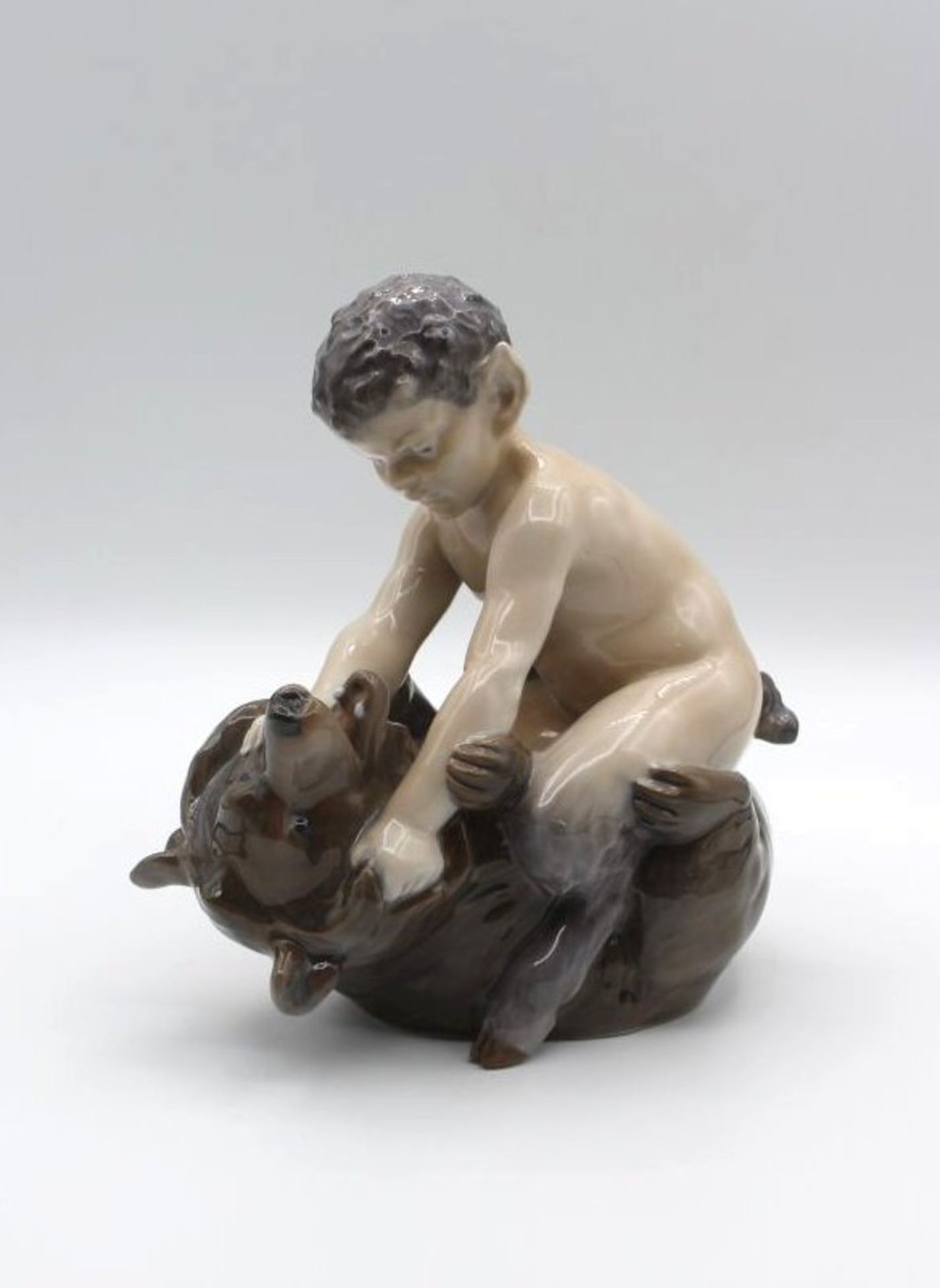 Faun mit Bär, Entw. Christian Thomsen, Royal Copenhagen, Mod.Nr. 648, 1x am Ohr restauriert,