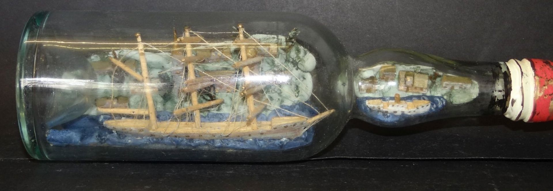 kl. Buddelschiff mit Diorama, wohl Fjordlandschaft, H-6 cm, L-22 cm