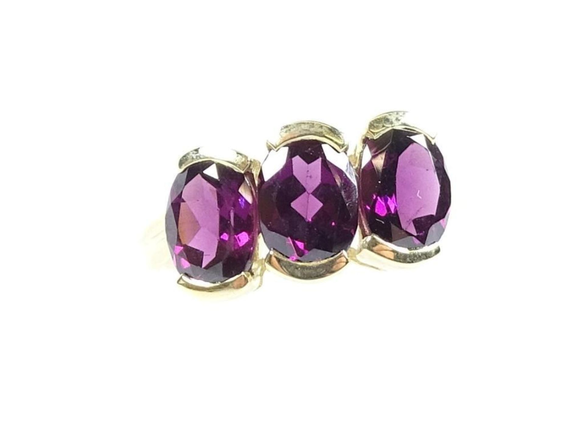 Goldring 375/000,violette Steine, RG 56/57, 4,1 Gramm,Juweliersauflösung-Ungetragene Ware / ohne