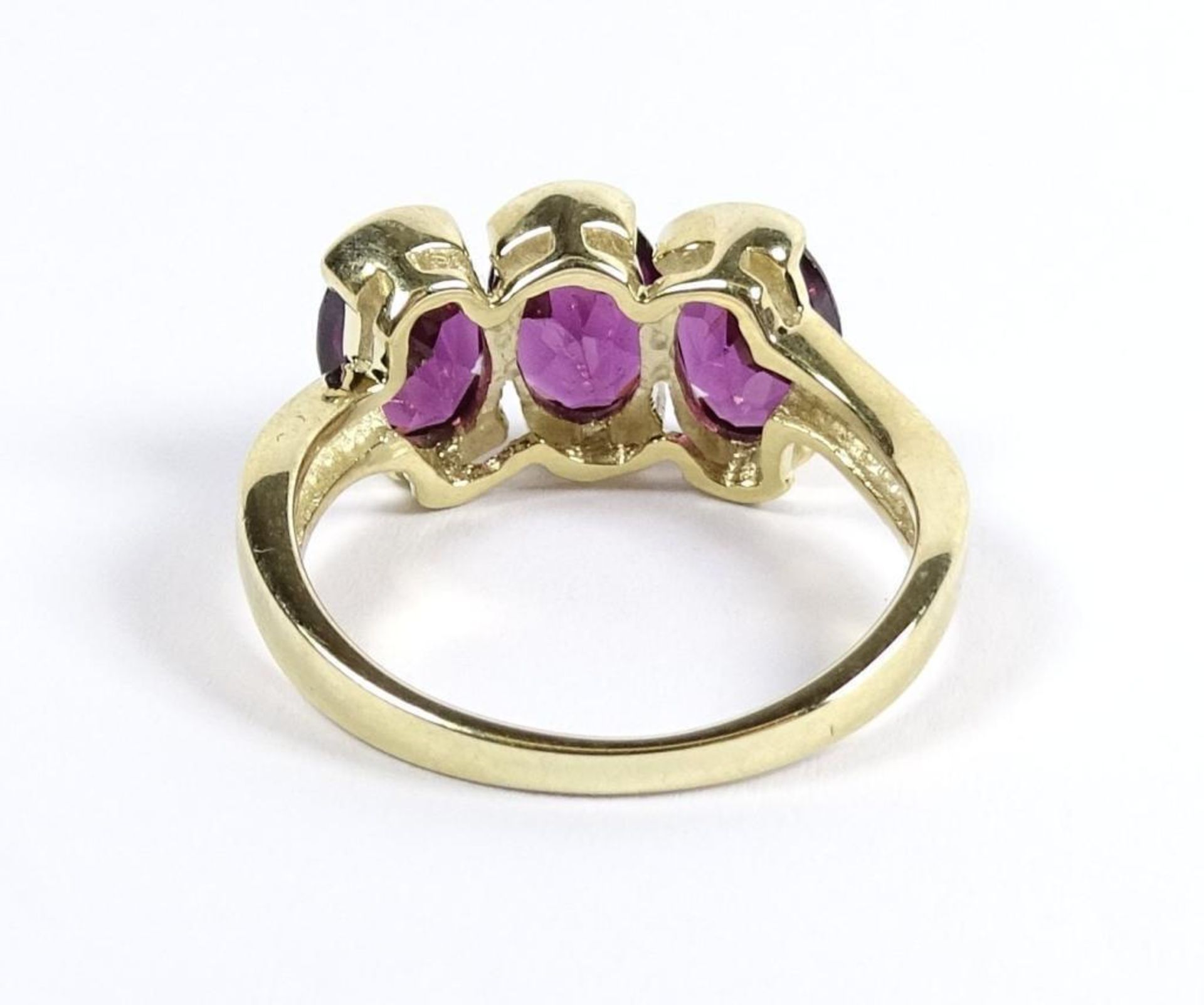 Goldring 375/000,violette Steine, RG 56/57, 4,1 Gramm,Juweliersauflösung-Ungetragene Ware / ohne - Bild 3 aus 3