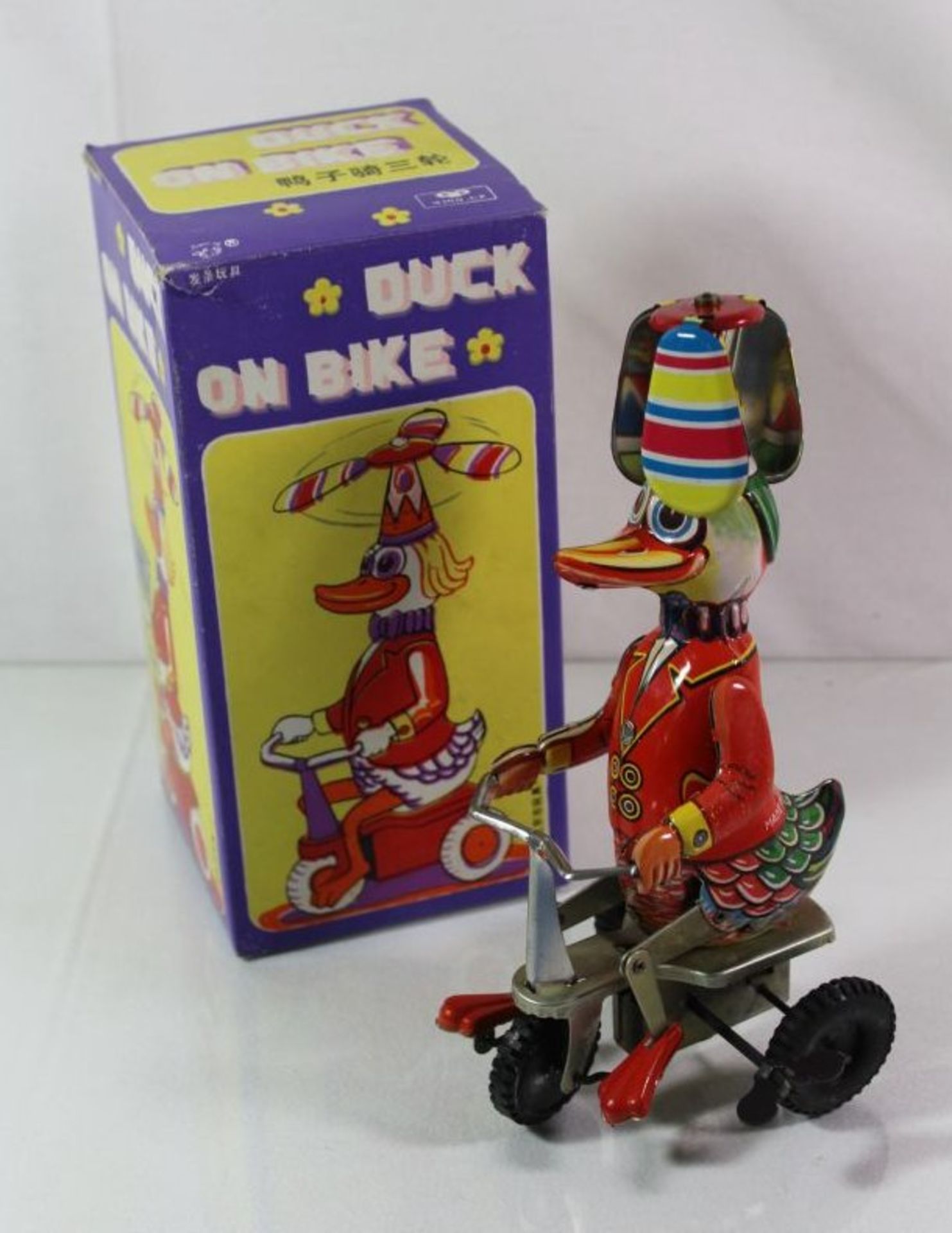 Duck on Bike, China, orig. Karton, H-20cm