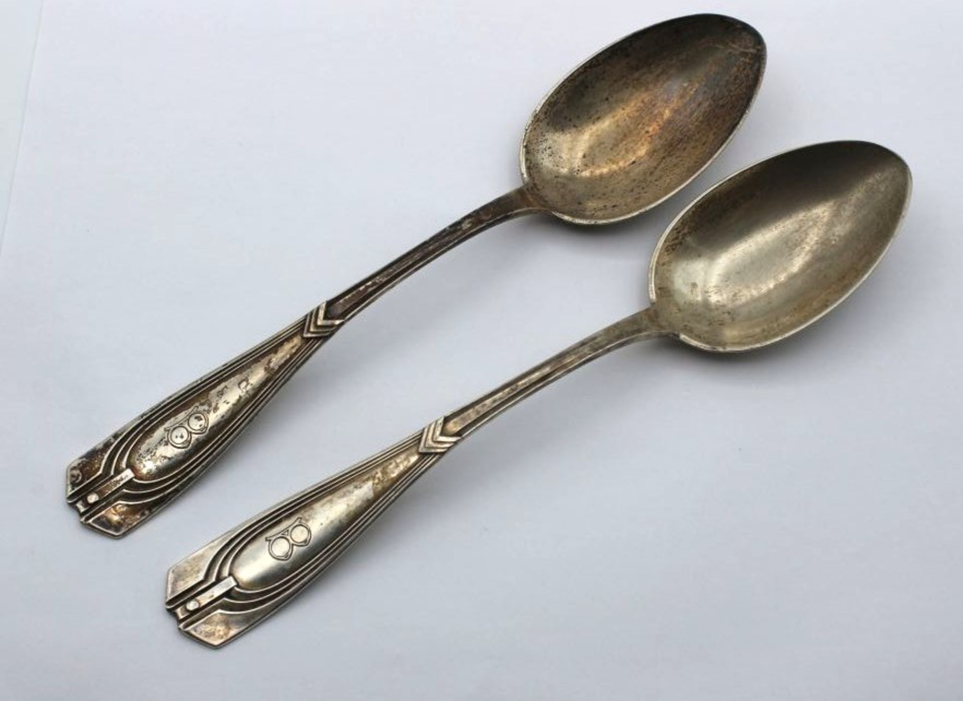 Paar Esslöffel, um 1905, Entw. Peter Behrens, 800er Silber, Ziermonogramm "B", zus. 140gr., 21,4cm.-