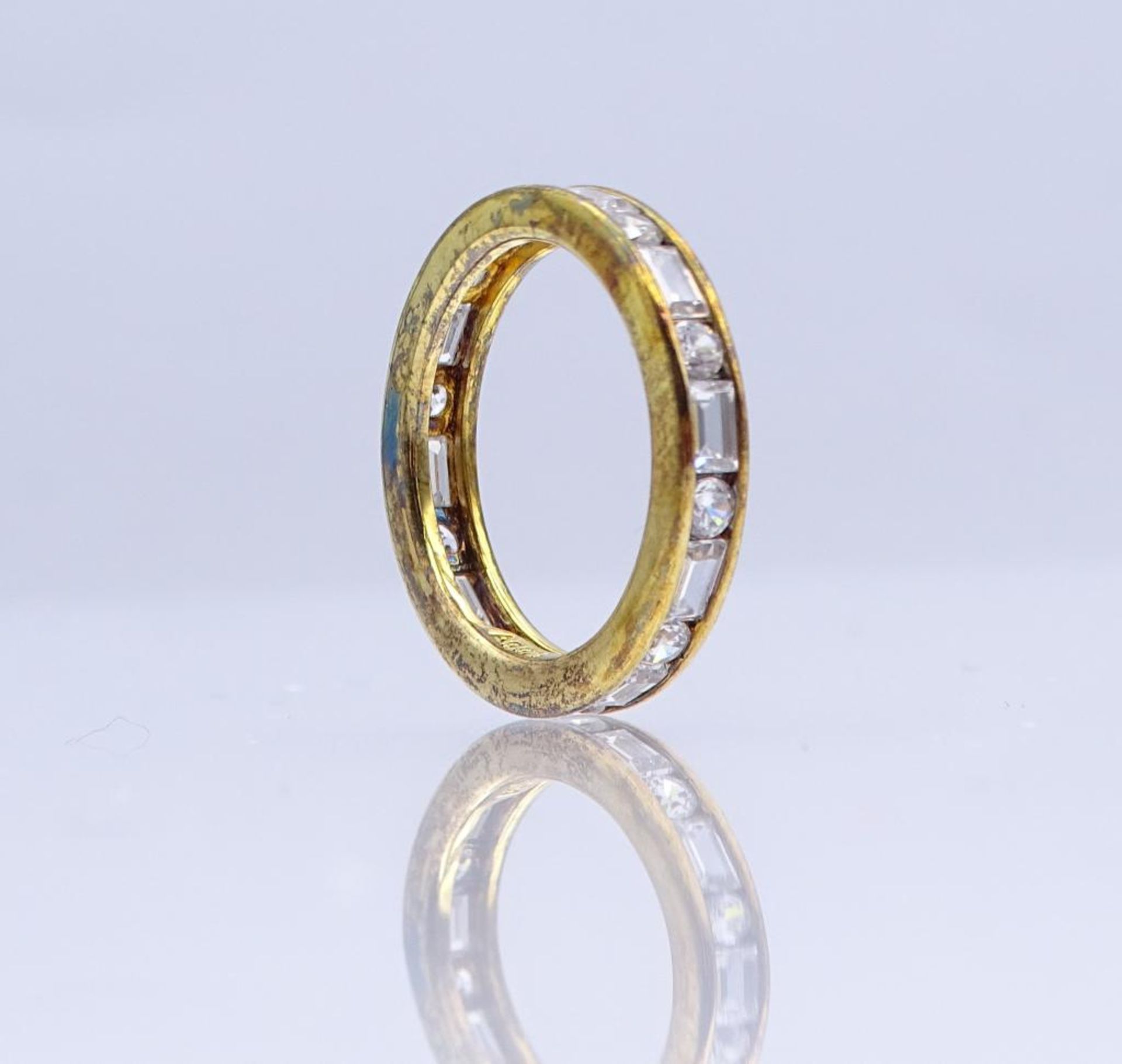 Ring Silber 925/000 vergoldet, mit rund und baguetteförmig fac. Zirkonia, RG 53, 3,5 g- - -22.61 %