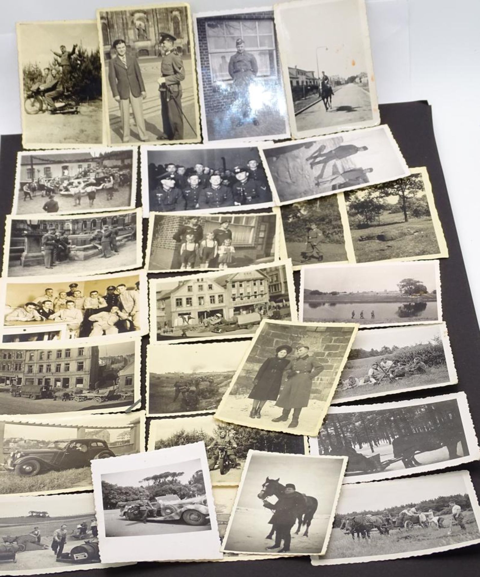Konvolut kl.Formatige Fotos, tw.Cuxhavener Ansichten Deichstrasse, 2.Weltkrieg,26 Stück, Format: