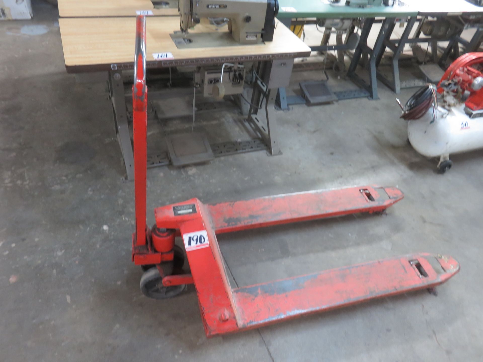 ORANGE STEEL HYDRAULIC PALLET TRUCK