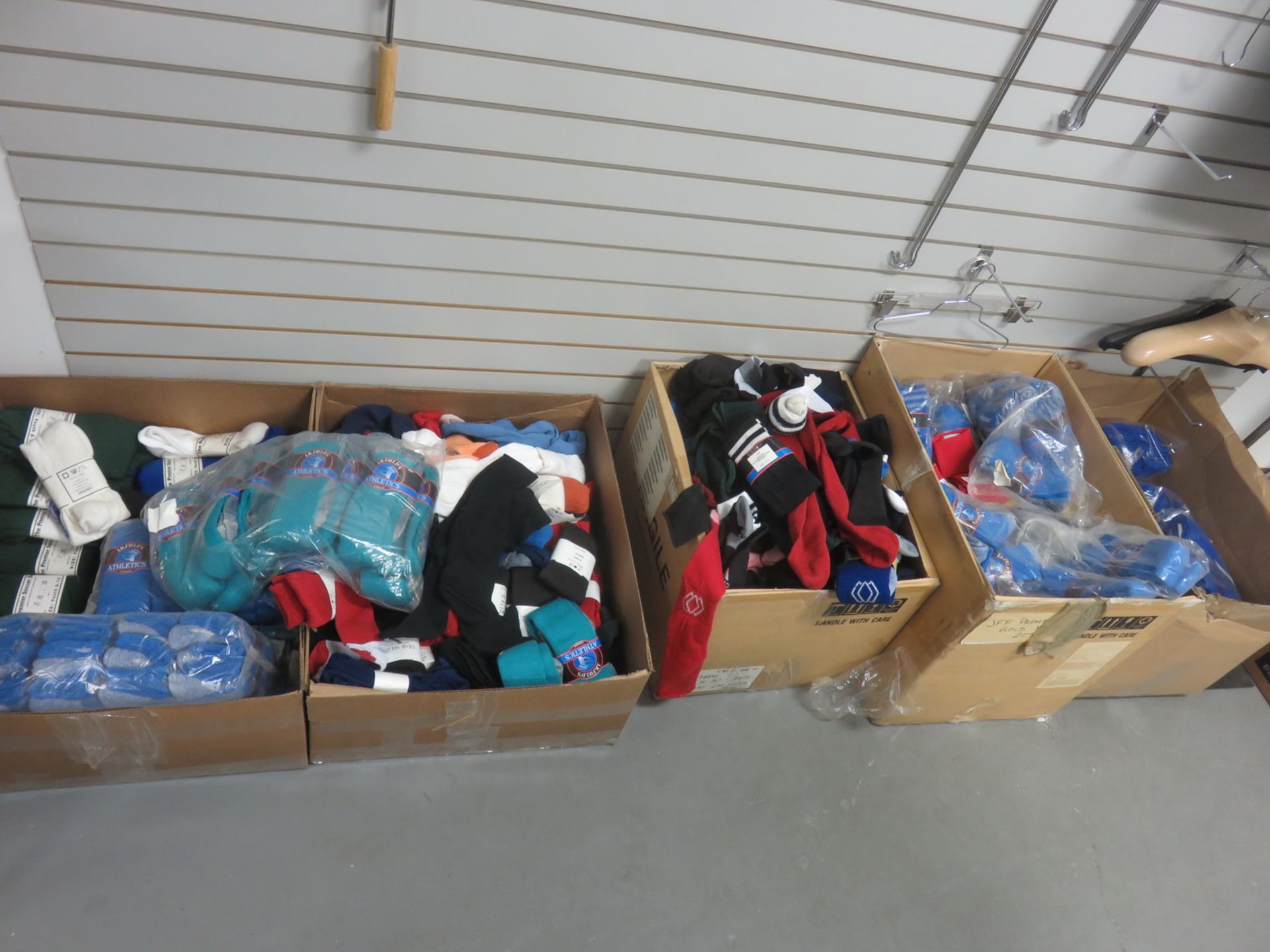 LOT - ASSORTED COLOR SOCCER SOCKS (LOCATED @ 122 INDUSTRY STREET)